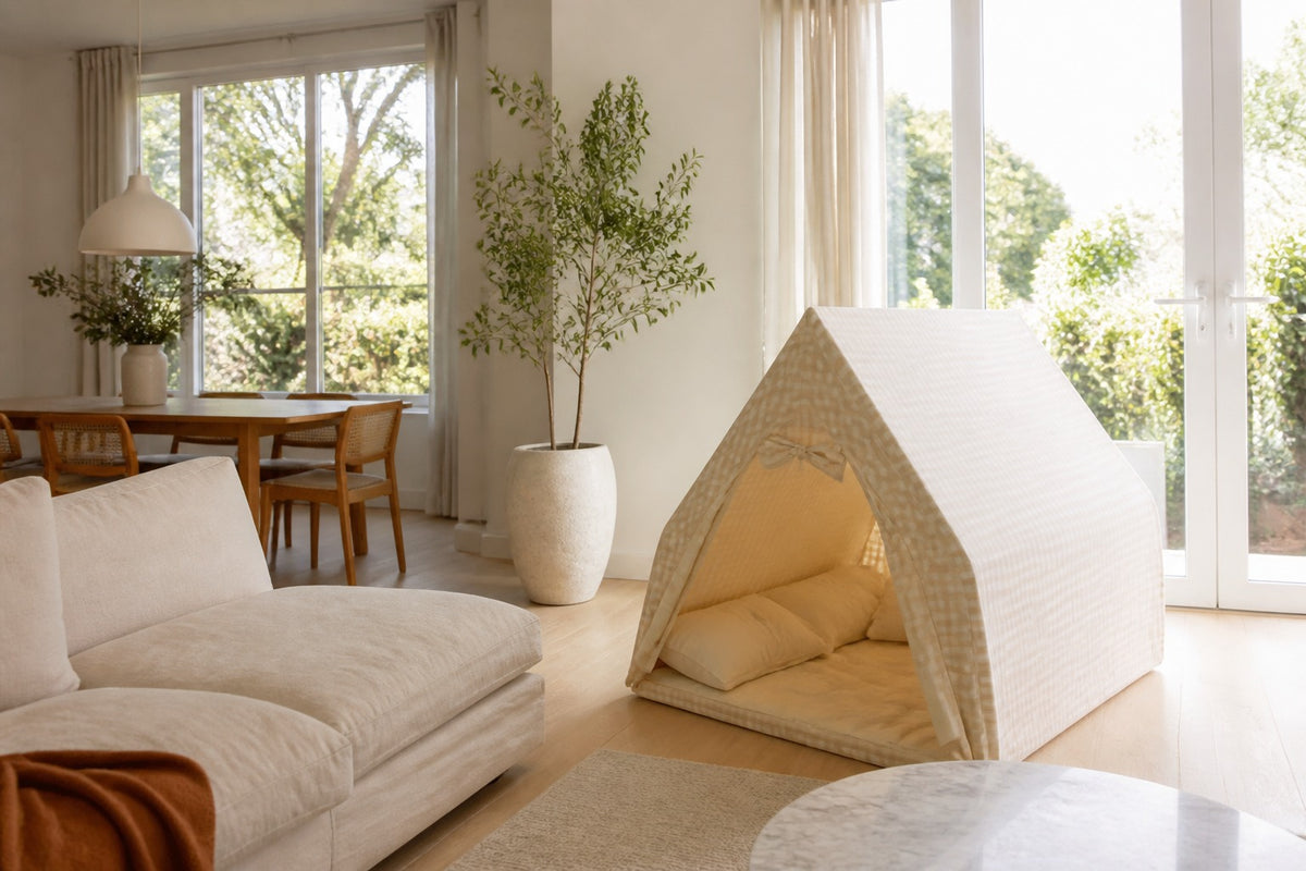 A CampCuddle play tent styled in a bright California living room with natural light