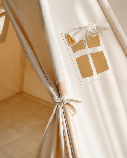Close-up of the canvas and animal topper detail on the Cuddle Camp Teepee
