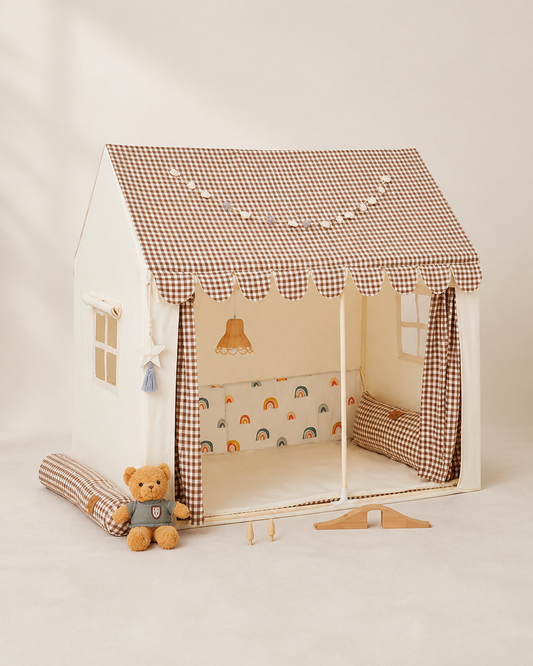 Cream kids playhouse tent with brown gingham roof and awning on a warm studio background