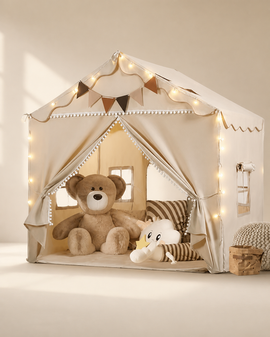 Large cream kids playhouse tent with lights and bunting on a warm studio background