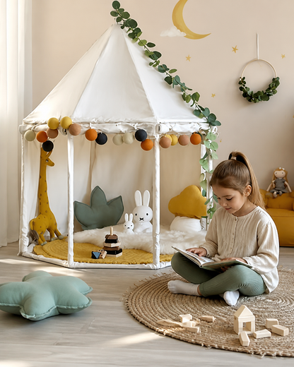 Child reading inside the Nordic Round Reading Tent