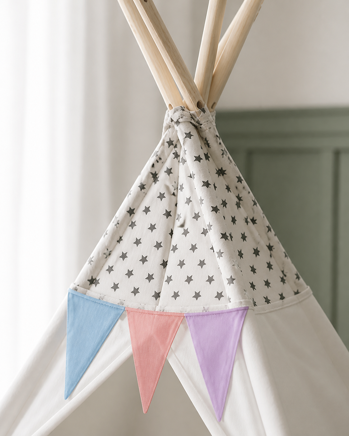 Close-up of the dot print fabric and padded mat of the Starlight Padded Teepee