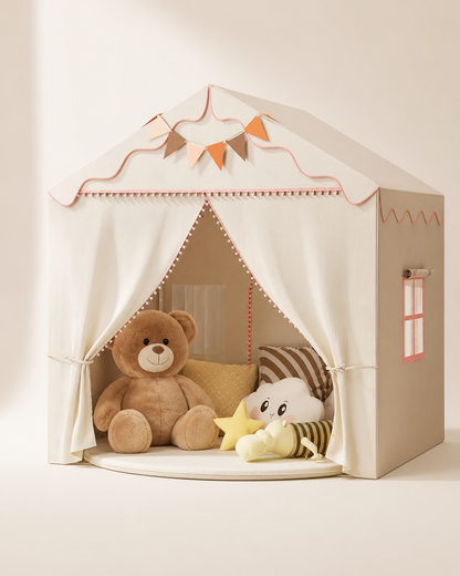 Cream cottage-style kids playhouse tent with scalloped trim on a warm studio background