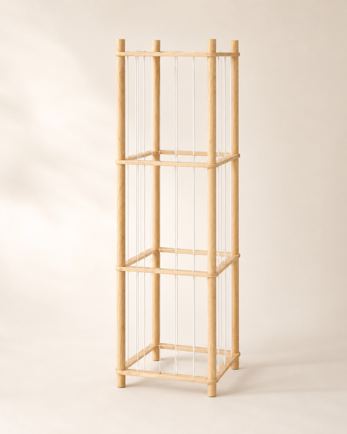 Empty stuffed animal storage rack showing the wooden frame and elastic cords